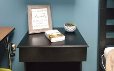 Local business owner donates custom beside tables to Emerge 